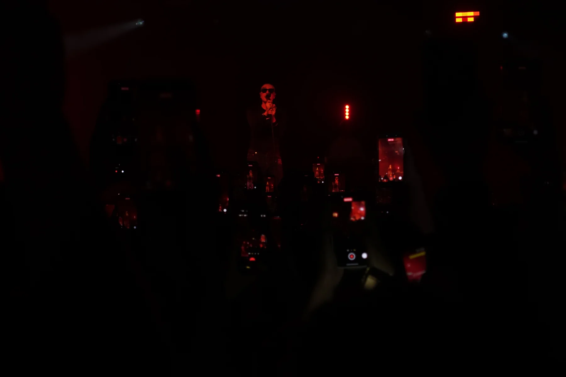 Performer in red stage light