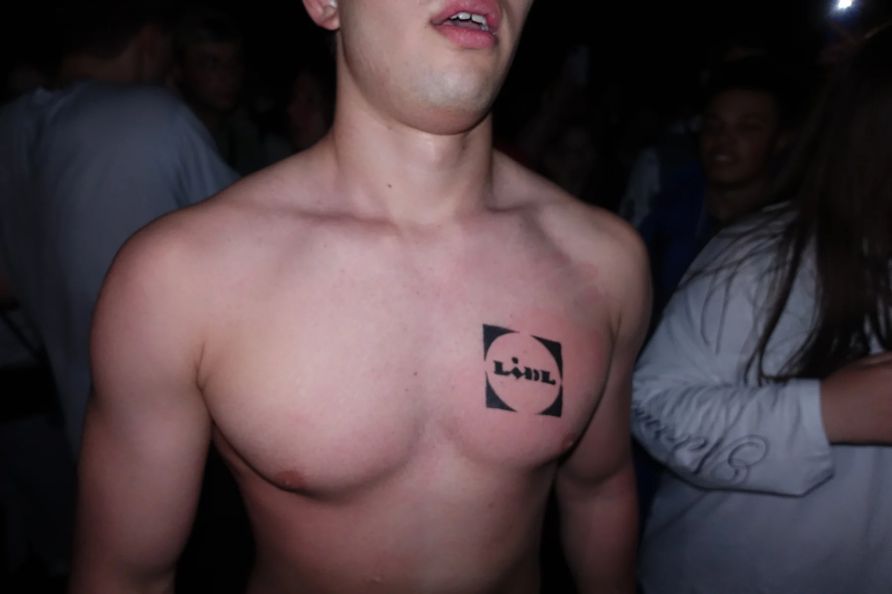 Close-up of a fan in the concert crowd